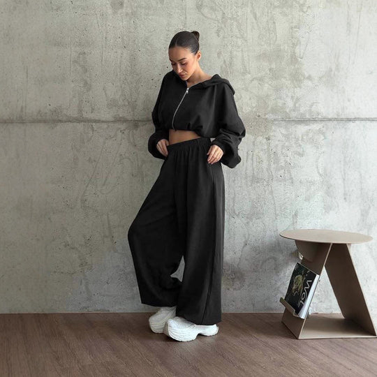 Damen cropped Kapuzen-Zipjacke mit Ballonärmeln und hochgeschnittener weiter Sweatpants-Set Nord Taschen