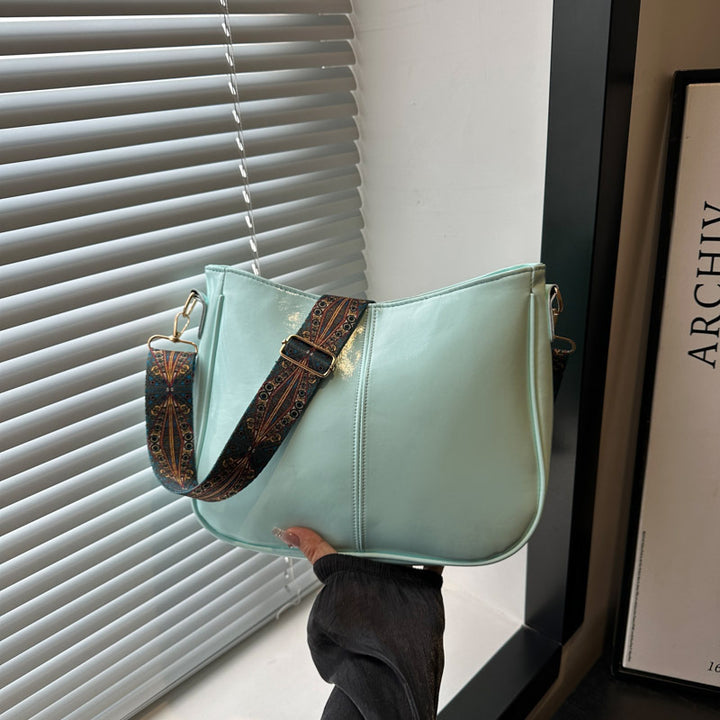 Damen elegante Umhängetasche mit kunstvollem Tragegurt Nord Taschen