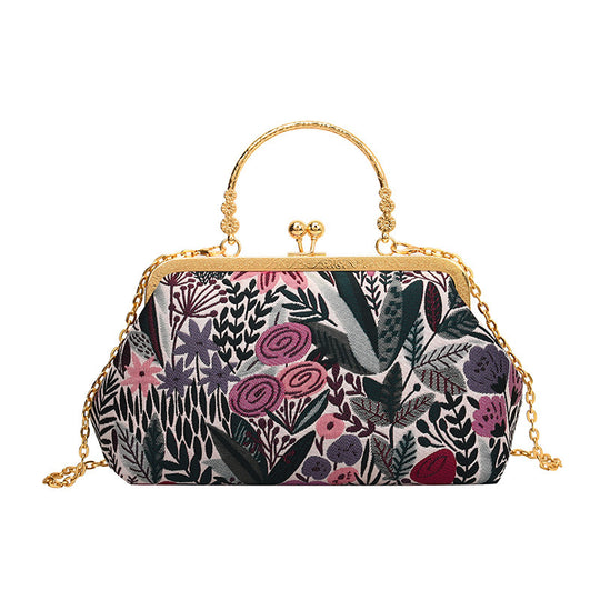 Damen Clutch-Tasche mit floralem Design und goldenen Akzenten Nord Taschen