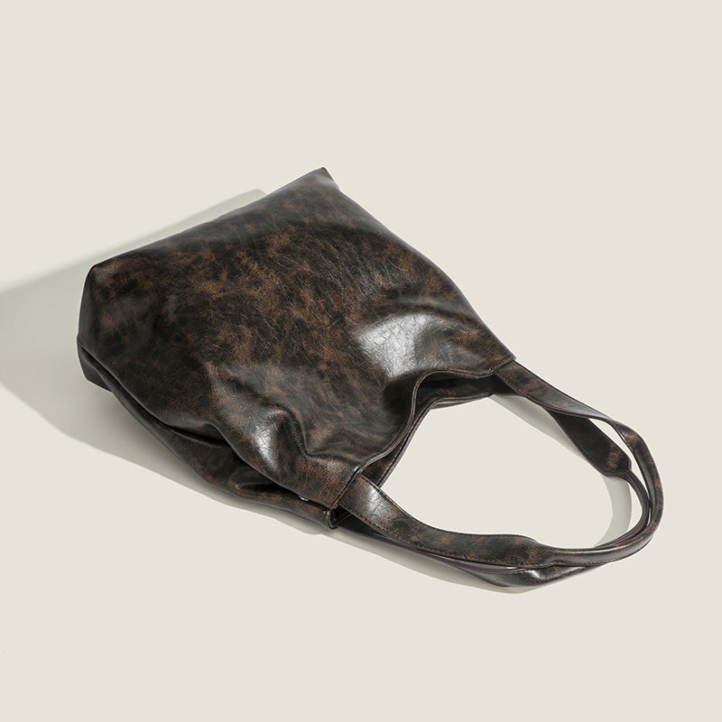 Damen Hobo-Tasche aus hochwertigem Kunstleder mit elegantem, geschwungenem Design Nord Taschen