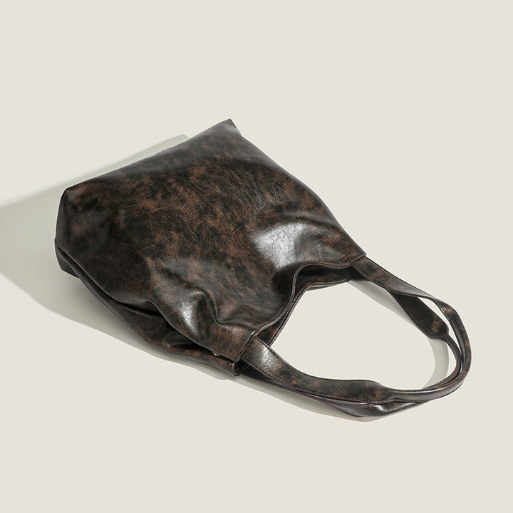 Damen Hobo-Tasche aus hochwertigem Kunstleder mit elegantem, geschwungenem Design Nord Taschen