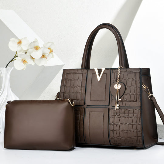 Damen Handtasche mit eleganter Kroko-Prägung und abnehmbarer Kosmetiktasche Nord Taschen