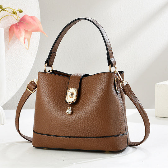 Damen elegante Handtasche mit goldenen Akzenten und abnehmbarem Schulterriemen Nord Taschen
