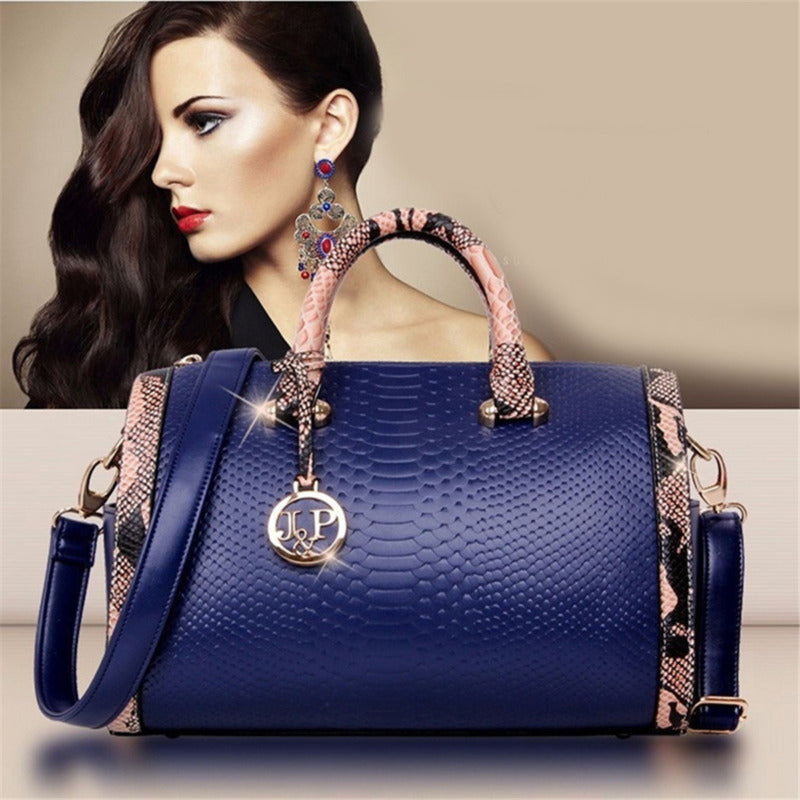 Damen Handtasche mit auffälliger Schlangenleder-Optik und eleganten Akzenten Nord Taschen