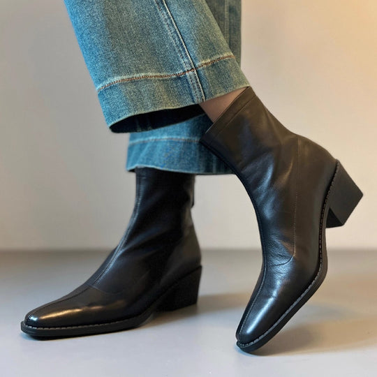 Damen Knöchelhohe Glattleder‑Stiefelette mit sculpted Keilabsatz Nord Taschen