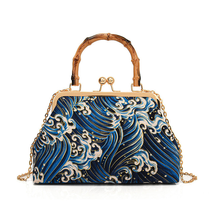 Damen Designer Handtasche mit kunstvollem Wellenmotiv Nord Taschen
