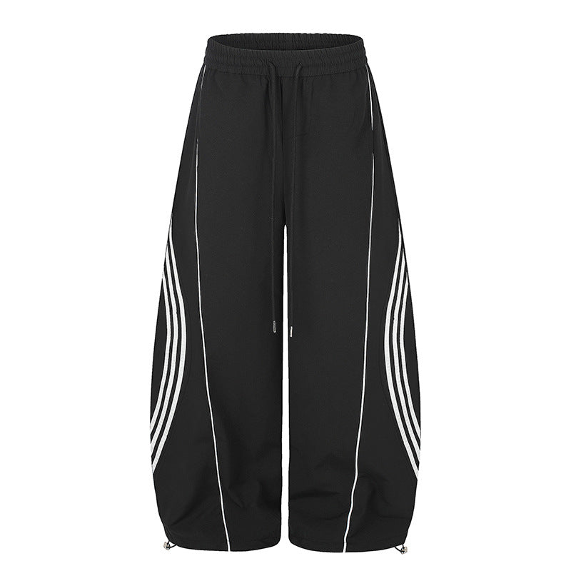 Damen Weite Tech-Material Palazzohose mit Tunnelzugbund, reflektierenden Seitenstreifen und verstellbarem Kordel-Saum Nord Taschen