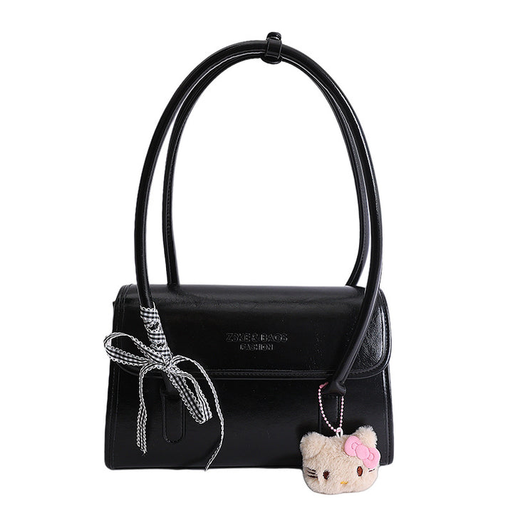 Damen elegante Handtasche mit verspieltem Stoffanhänger Nord Taschen