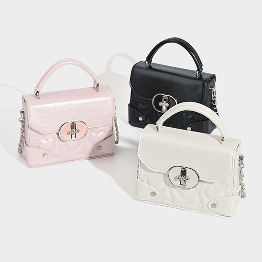 Damen Handtasche mit herzförmigem Design und schickem Kettenriemen Nord Taschen