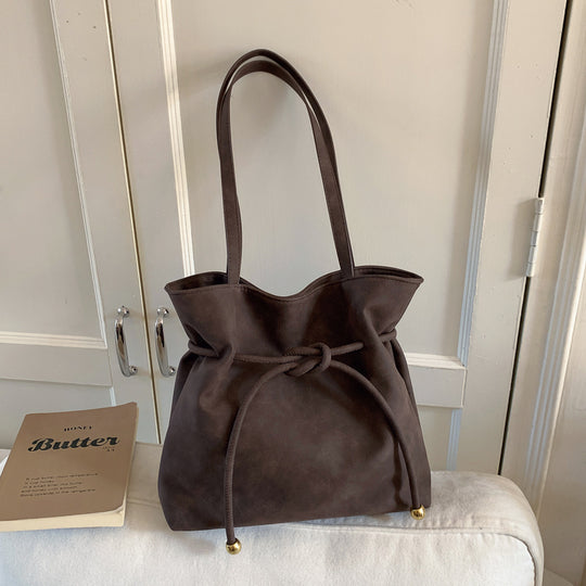 Damen Hobo-Tasche aus weichem Kunstleder mit praktischem Kordelzug Nord Taschen