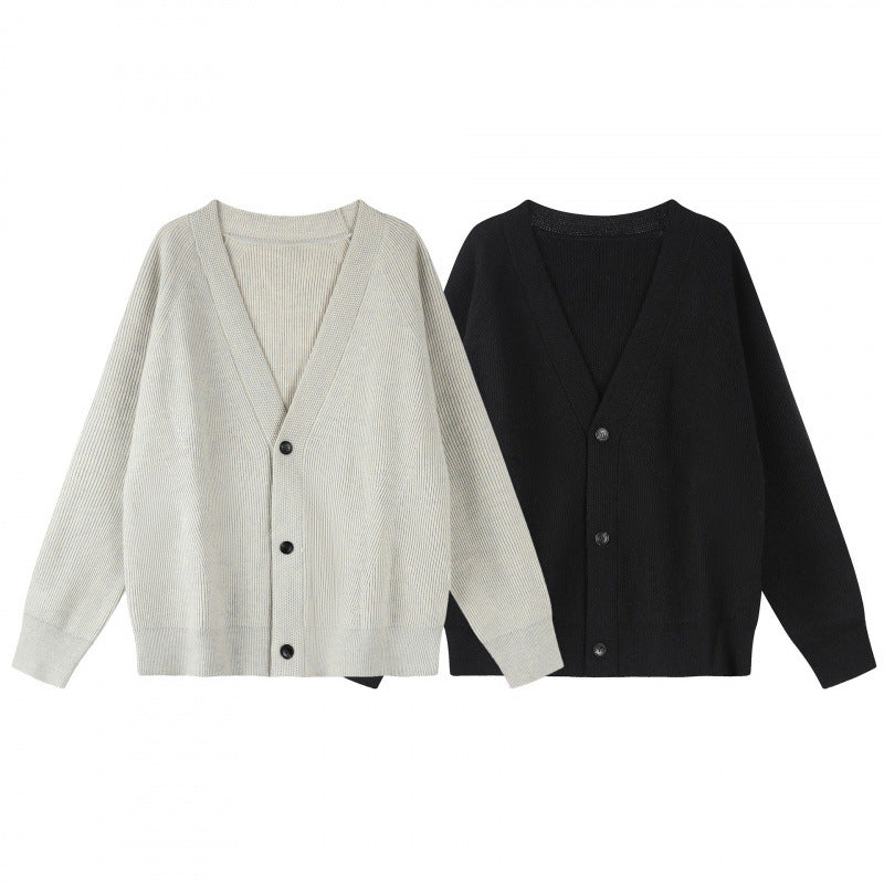 Unisex Boxy-Grobstrick-Cardigan mit V-Ausschnitt, Knopfleiste und Raglanärmeln Nord Taschen