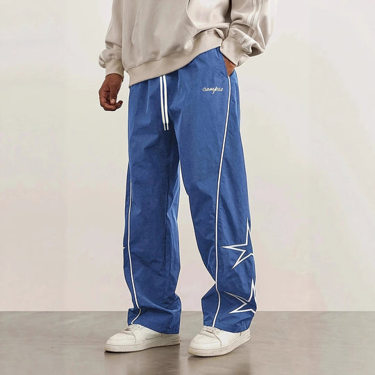 Herren Weite Trackpants mit Kontrastpaspel, Kordelzug und Sternapplikation Nord Taschen