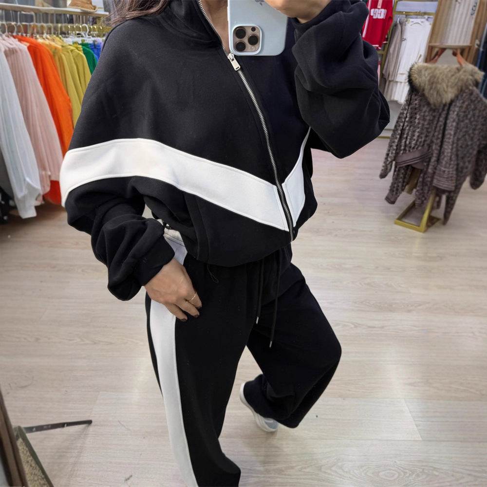 Damen eleganter sportlicher Zweiteiler Trainingsanzug mit Reißverschluss und kontrastierender V-Passe Nord Taschen