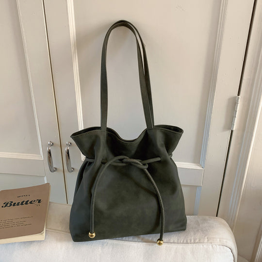 Damen Hobo-Tasche aus weichem Kunstleder mit praktischem Kordelzug Nord Taschen
