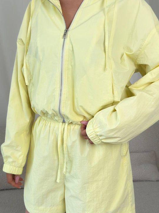 Damen lässiges Windbreaker-Set mit kurzen Hosen und Kapuze Nord Taschen