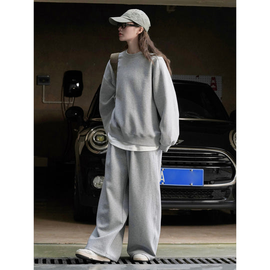 Damen Weite High‑Waist Sweatpalazzohose mit Tunnelzug, aufgesetzten Eingrifftaschen und fließender Oversize‑Silhouette Nord Taschen