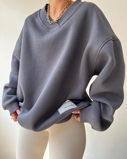 Damen Oversized Sweatshirt mit V-Ausschnitt und geripptem Kragen Nord Taschen