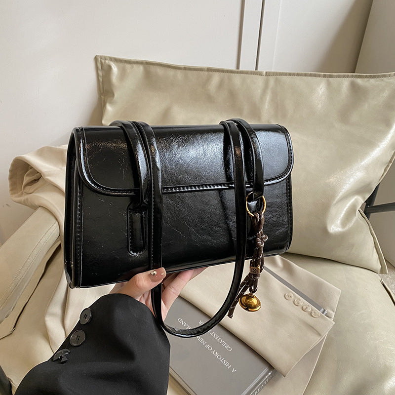 Damen elegante Umhängetasche mit schimmernder Oberfläche | Nord Taschen