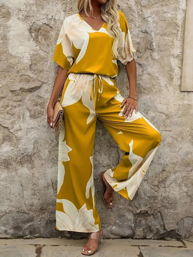 Damen Eleganter Jumpsuit mit floralen Mustern und weitem Bein