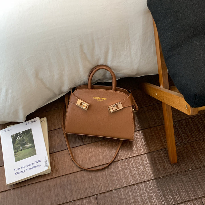 Damen elegante Handtasche mit verspieltem Verschluss Nord Taschen