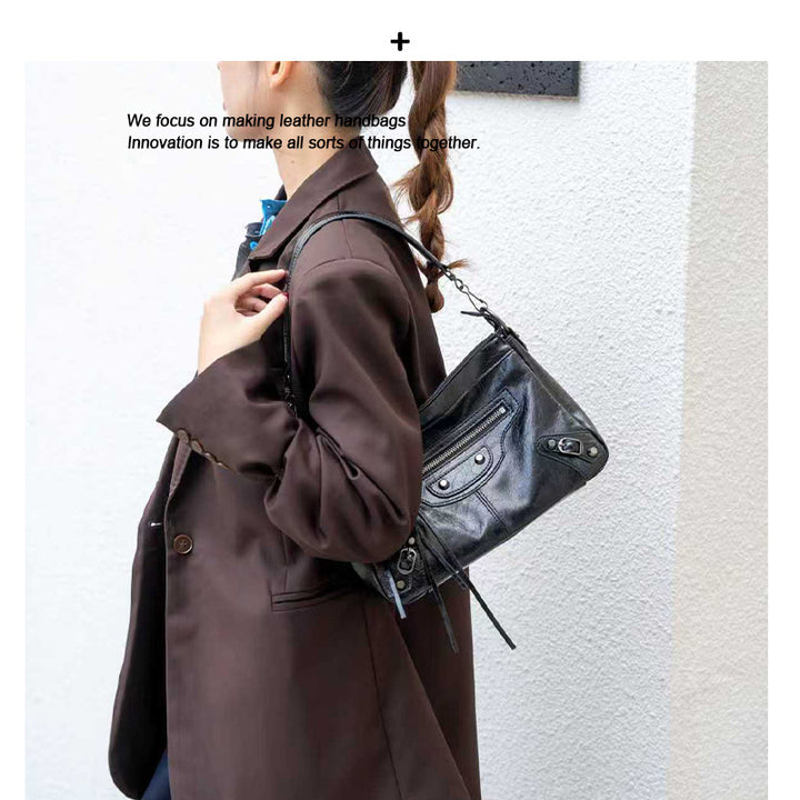 Damen hochwertige Wildlederhandtasche mit raffinierten Fransen Nord Taschen