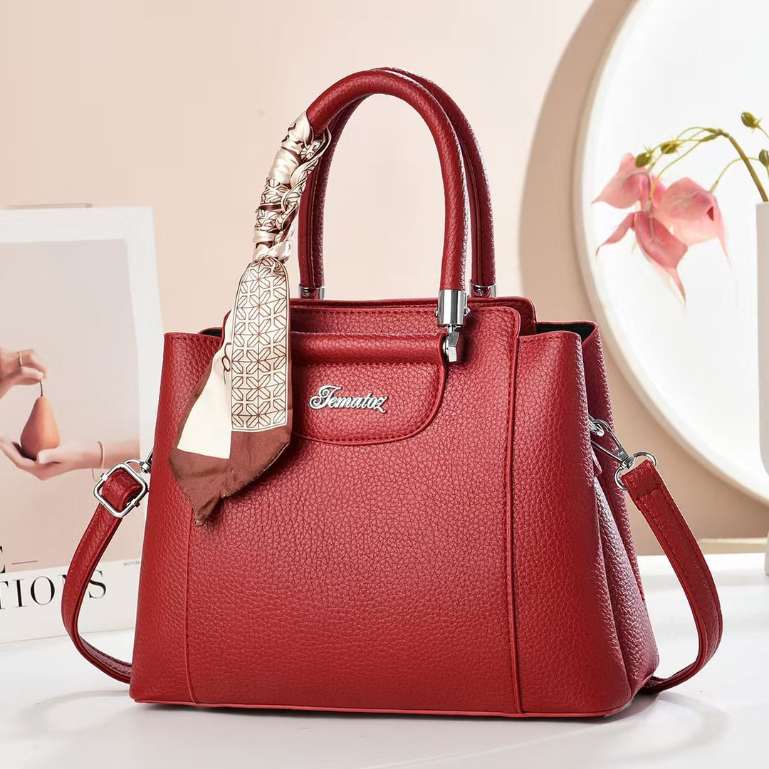 Damen Handtasche mit strukturiertem Kunstleder und stilvollem Schal Nord Taschen