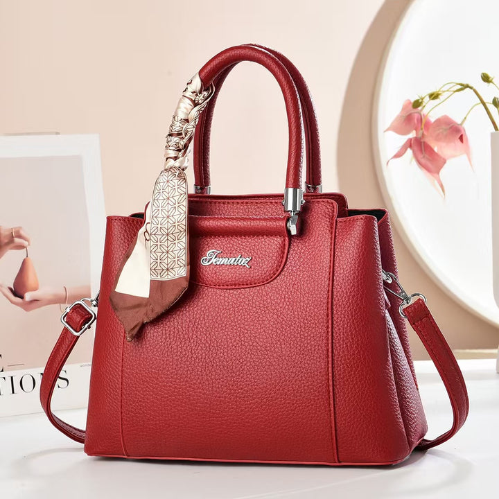 Damen Handtasche mit strukturiertem Kunstleder und stilvollem Schal Nord Taschen