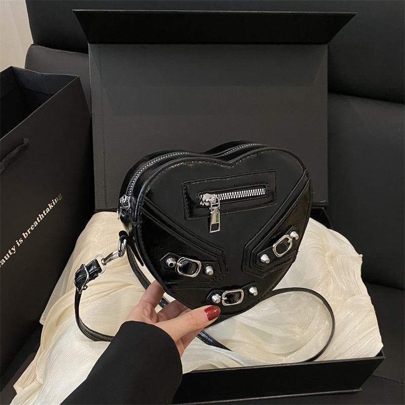 Damen herzförmige Handtasche mit verziertem Reißverschluss Nord Taschen