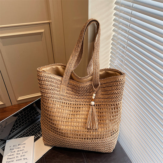 Damen elegante Strandtasche mit ausgefallenem Häkel-Design und dekorativen Quasten Nord Taschen