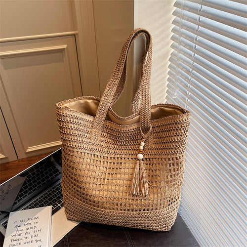 Damen elegante Strandtasche mit ausgefallenem Häkel-Design und dekorativen Quasten Nord Taschen