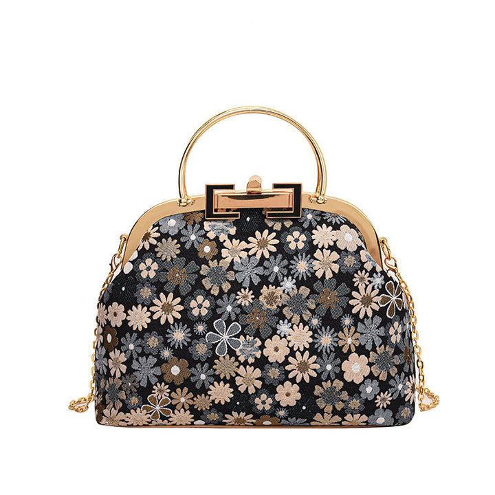 Damen elegante Umhängetasche mit floralen Akzenten und goldenen Verzierungen Nord Taschen