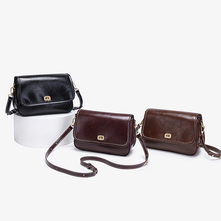 Damen Umhängetasche mit eleganter Klappenöffnung und luxuriösem Kunstleder Nord Taschen
