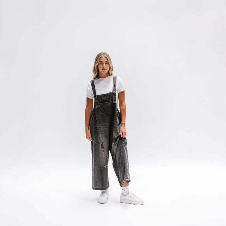 Damen lässige verwaschene Latzhose aus Jeansstoff mit Rissen und weitem Bein Nord Taschen