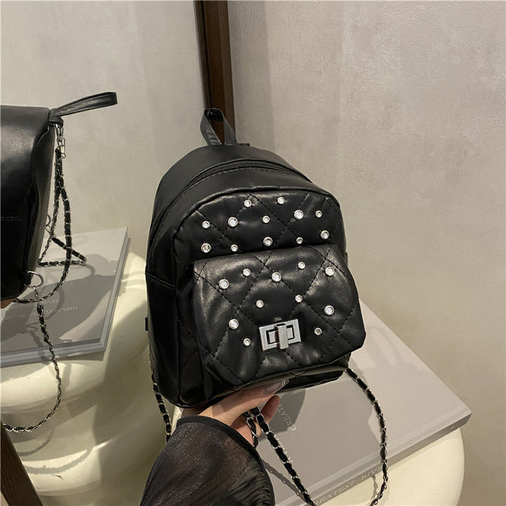 Damen Mini-Rucksackhandtasche mit eleganter Steppung und funkelnden Akzenten Nord Taschen
