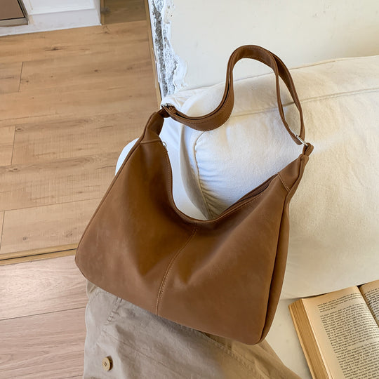 Damen Hobo-Tasche aus hochwertigem Leder mit luftigem Design Nord Taschen