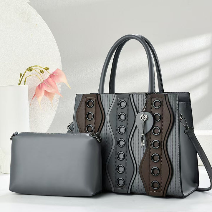Damen elegante Handtasche mit dekorativen Details Nord Taschen