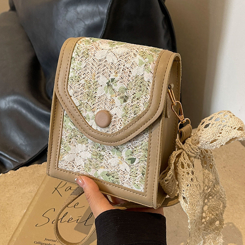 Damen Mini-Handtasche mit floralem Jacquard-Muster und verspieltem Kordelzug Nord Taschen