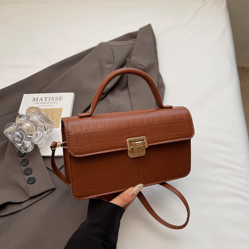 Damen elegante Umhängetasche mit verzierten Krokoprägedetails Nord Taschen