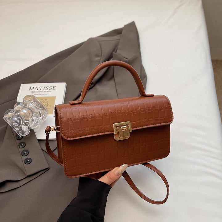 Damen elegante Umhängetasche mit verzierten Krokoprägedetails Nord Taschen