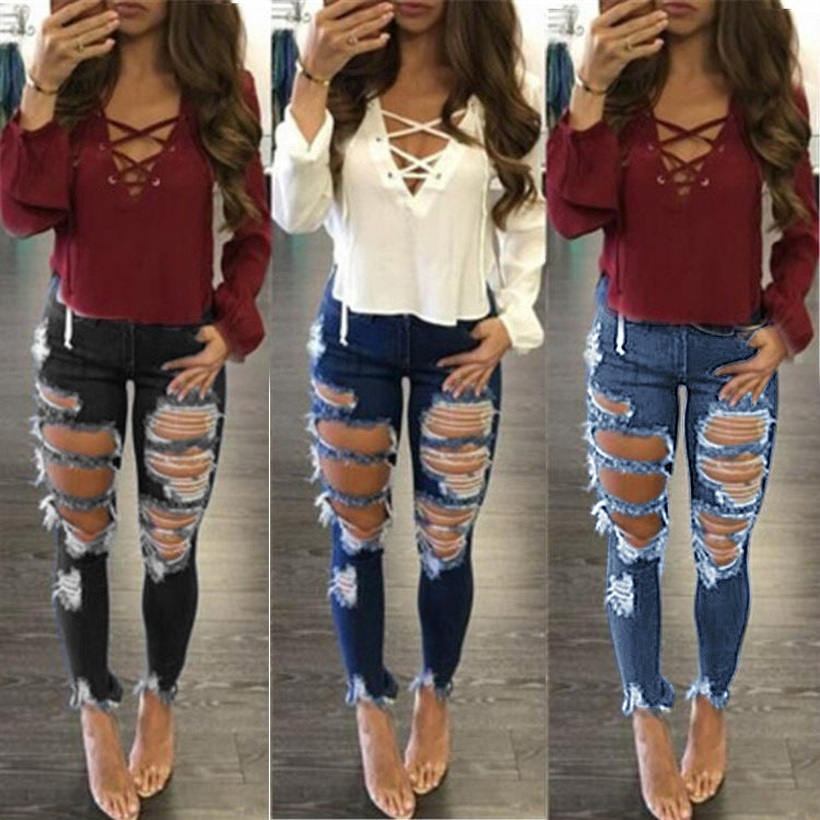 Damen Extrem zerrissene High-Waist Skinny-Jeans mit rohem Fransenbund Nord Taschen