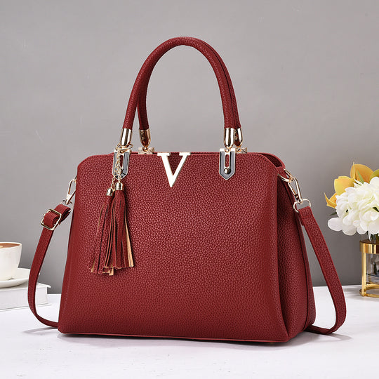 Damen Designer-Handtasche mit eleganter Quaste und abnehmbaren Schulterriemen Nord Taschen