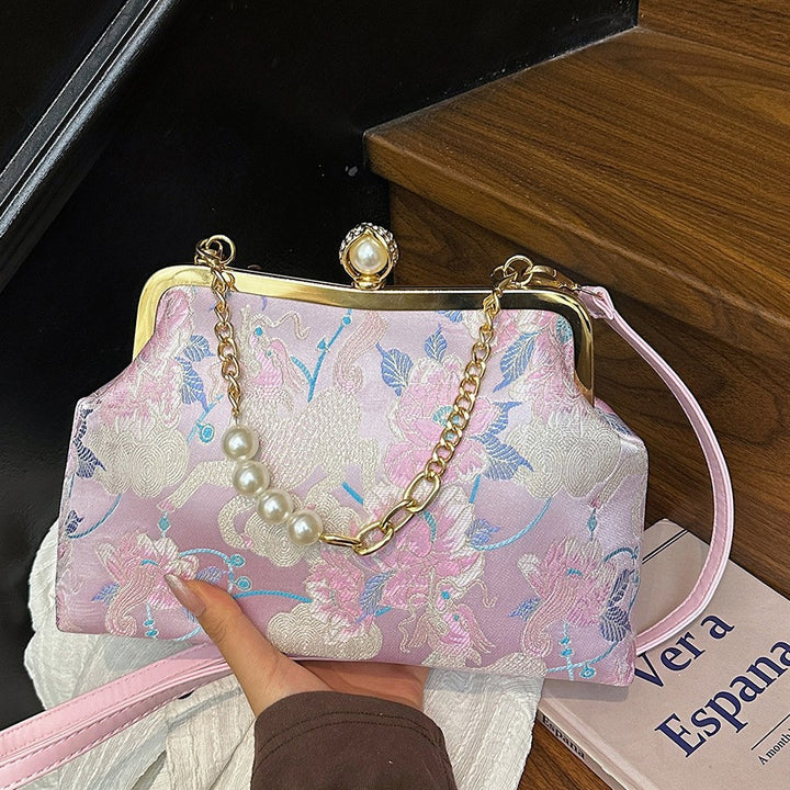 Damen elegante Clutch-Tasche mit floralem Motiv und exklusiver Kettenverzierung Nord Taschen