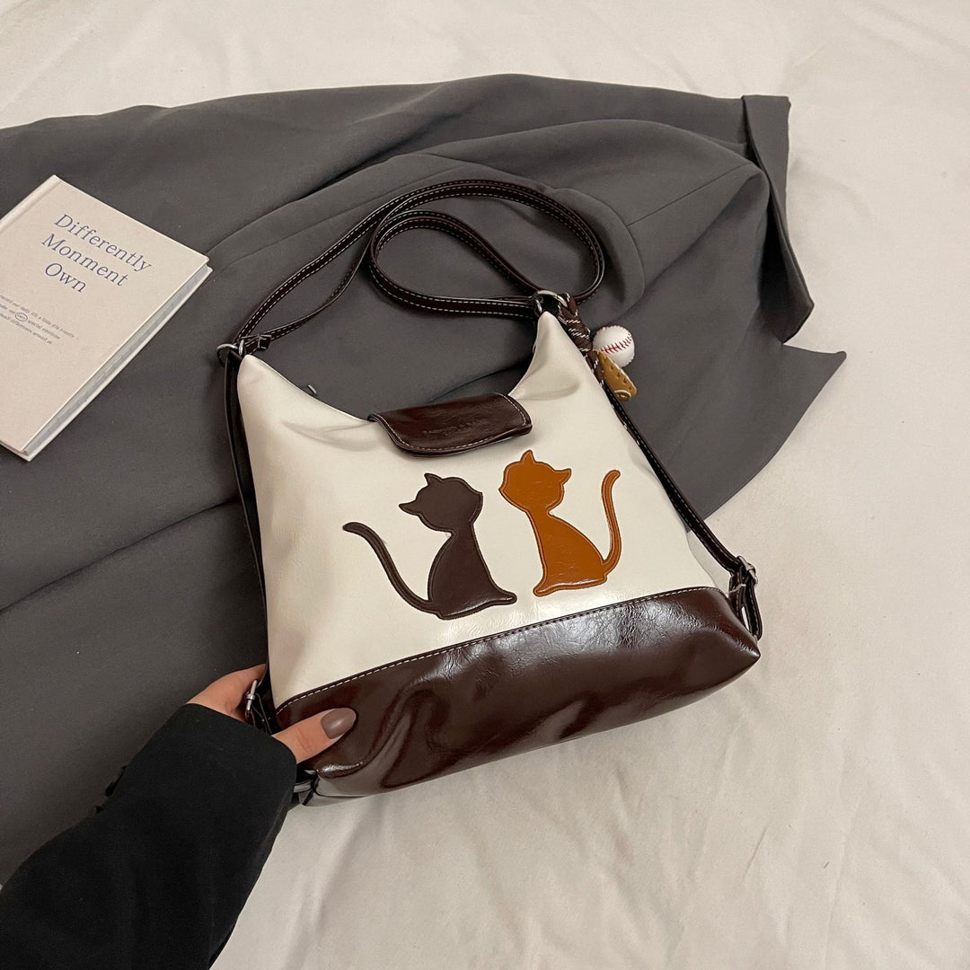 Damen Designer Umhängetasche mit verspieltem Katzenmotiv Nord Taschen