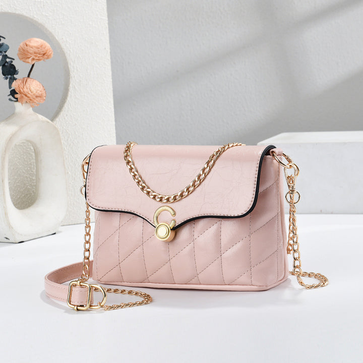 Damen Umhängetasche mit elegantem Steppdesign und goldenen Kettenakzenten Nord Taschen