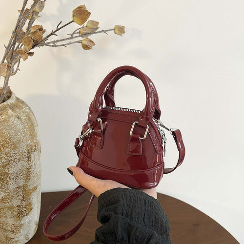 Damen Mini-Handtasche mit glänzender Oberfläche und modischem Reißverschluss Nord Taschen