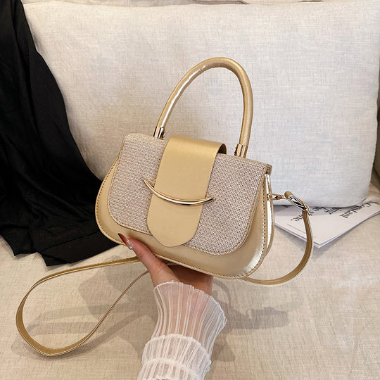 Damen elegante Umhängetasche mit schimmerndem Obermaterial und goldenen Akzent Nord Taschen