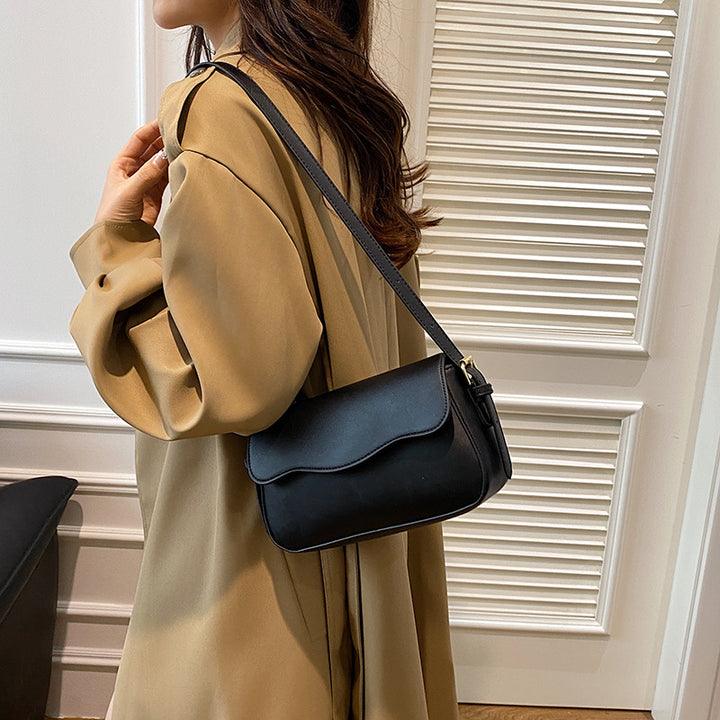 Damen Umhängetasche mit elegantem Wellenmuster Nord Taschen
