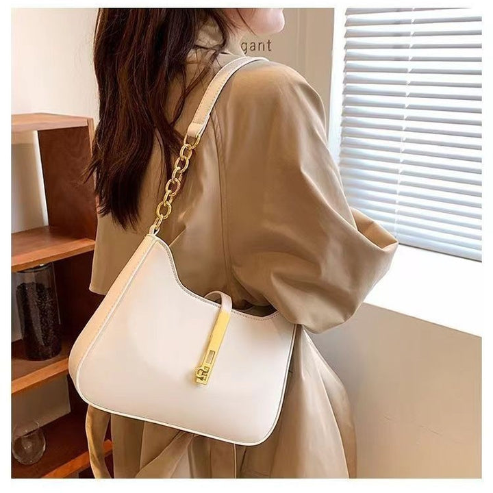 Damen Schultertasche mit goldfarbener Schnallenakzent und vielseitigem Design Nord Taschen