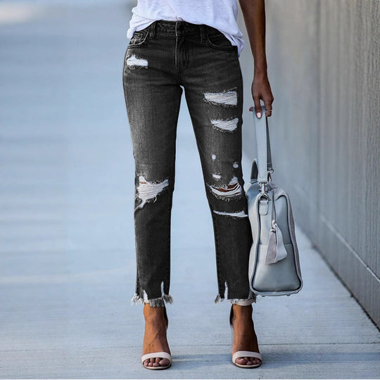 Damen Ripped Jeans im modernen Vintage-Look mit fransigen Säumen