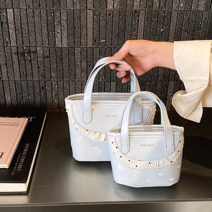 Damen modische Handtasche mit verspieltem Rüschendesign Nord Taschen